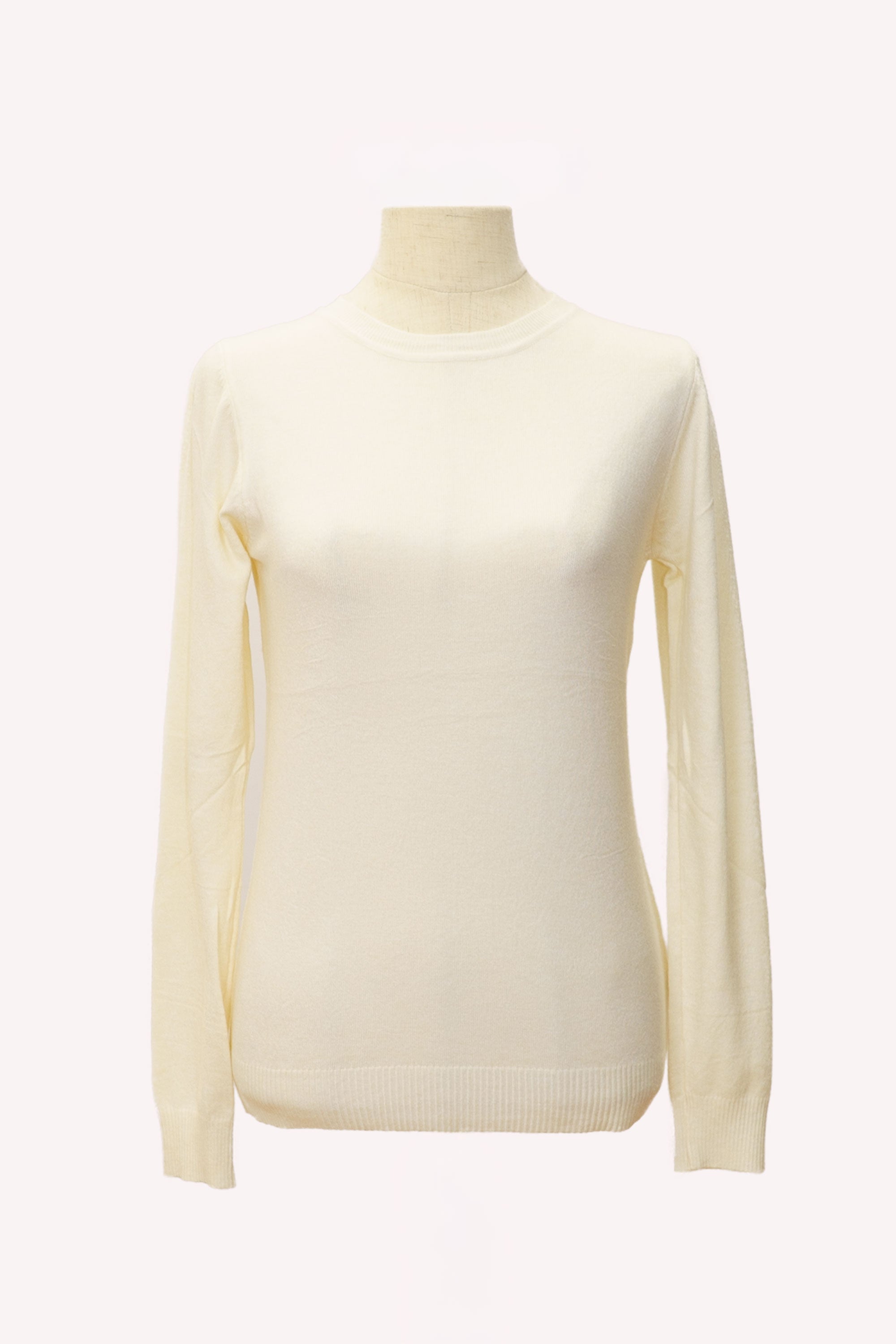 Jersey de punto liso crema manga larga para mujer
